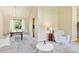 Open-concept living area with a dining table and comfortable seating at 6083 S Glencoe Way, Centennial, CO 80121