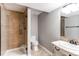 Bathroom displaying a glass shower, vanity sink, and neutral color palette at 7163 S Xanthia St, Centennial, CO 80112