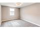 Bright bedroom features a window and neutral color scheme with plush carpet at 7163 S Xanthia St, Centennial, CO 80112