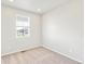 Bright bedroom with neutral walls and carpet flooring at 8905 Rifle St, Commerce City, CO 80022