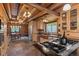 Well-equipped kitchen featuring stainless steel appliances, wooden cabinets, and a spacious layout at 6241 Kilimanjaro Dr, Evergreen, CO 80439