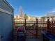 Private backyard with wooden fence and a barbecue grill at 1732 S Blackhawk Way # D, Aurora, CO 80012