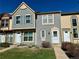 Charming townhome featuring a well-maintained lawn and cozy front entrances with great curb appeal at 1732 S Blackhawk Way # D, Aurora, CO 80012