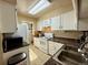 Functional kitchen features white cabinets, modern appliances and countertops, creating a clean look at 1732 S Blackhawk Way # D, Aurora, CO 80012