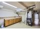 Utility room in basement with sink and storage at 2481 Garrison St, Lakewood, CO 80215