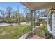 Charming home features a well-kept yard with colorful flowers and a welcoming entrance at 2481 Garrison St, Lakewood, CO 80215