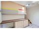 Bright workspace features custom cabinets, desk, and creative design elements at 2481 Garrison St, Lakewood, CO 80215
