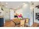 Bright eat-in kitchen features white appliances and wood floors and countertops at 2595 S Irving St, Denver, CO 80219