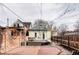 Charming backyard featuring a patio with seating, a lush lawn, and string lights for outdoor enjoyment at 2909 Glenarm Pl, Denver, CO 80205