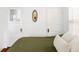 Cozy bedroom featuring hardwood floors and an olive green bedspread at 2909 Glenarm Pl, Denver, CO 80205