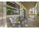 Comfortable outdoor patio featuring chairs, a table and great views of the community at 8225 Fairmount Dr # 102, Denver, CO 80247