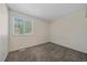 Neutral bedroom with a window and plush carpeting at 8438 Everett Way # B, Arvada, CO 80005