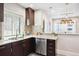 This updated kitchen has stainless steel appliances and granite countertops with plenty of counter space at 1484 Cherry St, Denver, CO 80220
