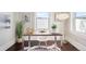 Bright office space featuring a large window and tasteful decor at 1484 Cherry St, Denver, CO 80220