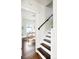 View of stairway leading to a bright, well-lit office space with great natural light at 1484 Cherry St, Denver, CO 80220