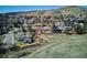 Beautiful aerial view of homes nestled amidst trees and landscape, close to green spaces at 14259 W Virginia Dr, Lakewood, CO 80228