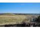 Panoramic view from backyard featuring vast fields and scenic landscape in the distance at 14259 W Virginia Dr, Lakewood, CO 80228