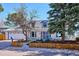 Charming two-story home with a well-manicured front yard and a cozy, welcoming curb appeal at 14259 W Virginia Dr, Lakewood, CO 80228