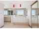 Main bathroom featuring a soaking tub with jets and a window at 14259 W Virginia Dr, Lakewood, CO 80228
