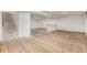 Spacious finished basement featuring carpeting, white walls, and a staircase to the upper level at 3334 W Grand Ave, Englewood, CO 80110