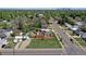 Wide aerial view of the neighborhood, property, street, and community amenities, highlighting its convenient location at 2401 W Jewell Ave, Denver, CO 80219