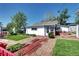 Charming backyard with lovely patio and garden space at 2401 W Jewell Ave, Denver, CO 80219