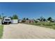 Spacious gravel backyard perfect for parking RV, boat, or other vehicles with easy access to the property at 2401 W Jewell Ave, Denver, CO 80219