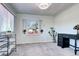 Bright open room boasts lots of natural light and plenty of open space for entertaining at 2401 W Jewell Ave, Denver, CO 80219