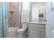 Bright bathroom featuring a shower-tub combination at 3936 Costillo Ct, Brighton, CO 80601