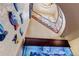 View of grand staircase with fish tank at 9132 Scenic Pine Dr, Parker, CO 80134