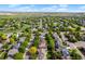Aerial view of the neighborhood showing open green space, mature trees, and low-traffic, safe residential streets at 14794 Vine St, Thornton, CO 80602