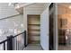 Exterior storage closet with shelves on balcony area, great space for tools and other utility items at 221 S Garfield St # 213, Denver, CO 80209