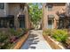 Charming townhomes featuring beautiful gardens and inviting entryway at 221 S Garfield St # 213, Denver, CO 80209