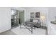 Cozy living room featuring a sliding glass door, comfortable seating, and modern decor at 221 S Garfield St # 213, Denver, CO 80209