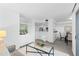 Cozy living room with eating area and partial kitchen view at 221 S Garfield St # 213, Denver, CO 80209