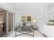 Cozy living room featuring a sliding glass door, comfortable seating, and modern decor at 221 S Garfield St # 213, Denver, CO 80209