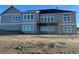 Rear view of a home with large windows and walkout deck at 270 High Meadows Loop, Elizabeth, CO 80107