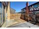 Small backyard with a patio and wooden fence at 3855 S Monaco St # 167, Denver, CO 80237