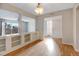 Dining room with built-in shelving and view into living room at 3855 S Monaco St # 167, Denver, CO 80237