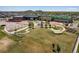 Aerial view of a modern school with playgrounds and walking paths in a community setting at 11033 E 28Th Pl, Denver, CO 80238
