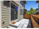 Cozy outdoor patio with tile floor, sliding door to home, and fenced perimeter at 11033 E 28Th Pl, Denver, CO 80238