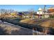 Charming community park featuring a flowing creek, playground, and colorful murals for Gathering enjoyment at 11033 E 28Th Pl, Denver, CO 80238