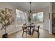 Bright kitchen nook with a round table and chairs, perfect for dining at 2903 S Walden Way, Aurora, CO 80013