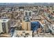 A beautiful, sunny aerial view highlights the property's prime location within the bustling city at 800 N Pearl St # 206, Denver, CO 80203