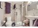 Bathroom featuring glass enclosed shower, and a white pedestal sink at 800 N Pearl St # 206, Denver, CO 80203