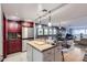 Modern kitchen with an island, stainless steel appliances, ample cabinet space, and an open layout at 800 N Pearl St # 206, Denver, CO 80203