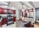 Well-equipped kitchen featuring stainless steel appliances, a breakfast bar, and plenty of storage space at 800 N Pearl St # 206, Denver, CO 80203