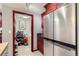 Modern kitchen with stainless steel refrigerator, wood cabinets, and a walk-in pantry at 800 N Pearl St # 206, Denver, CO 80203