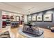 Open floor plan with a dining area adjacent to the kitchen, featuring hardwood floors and modern lighting at 800 N Pearl St # 206, Denver, CO 80203