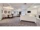 Spacious living room with modern furniture and neutral color palette with a decorative fireplace at 800 N Pearl St # 206, Denver, CO 80203